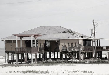 wind damage - spray foam can help prevent uplift to Henderson roofs